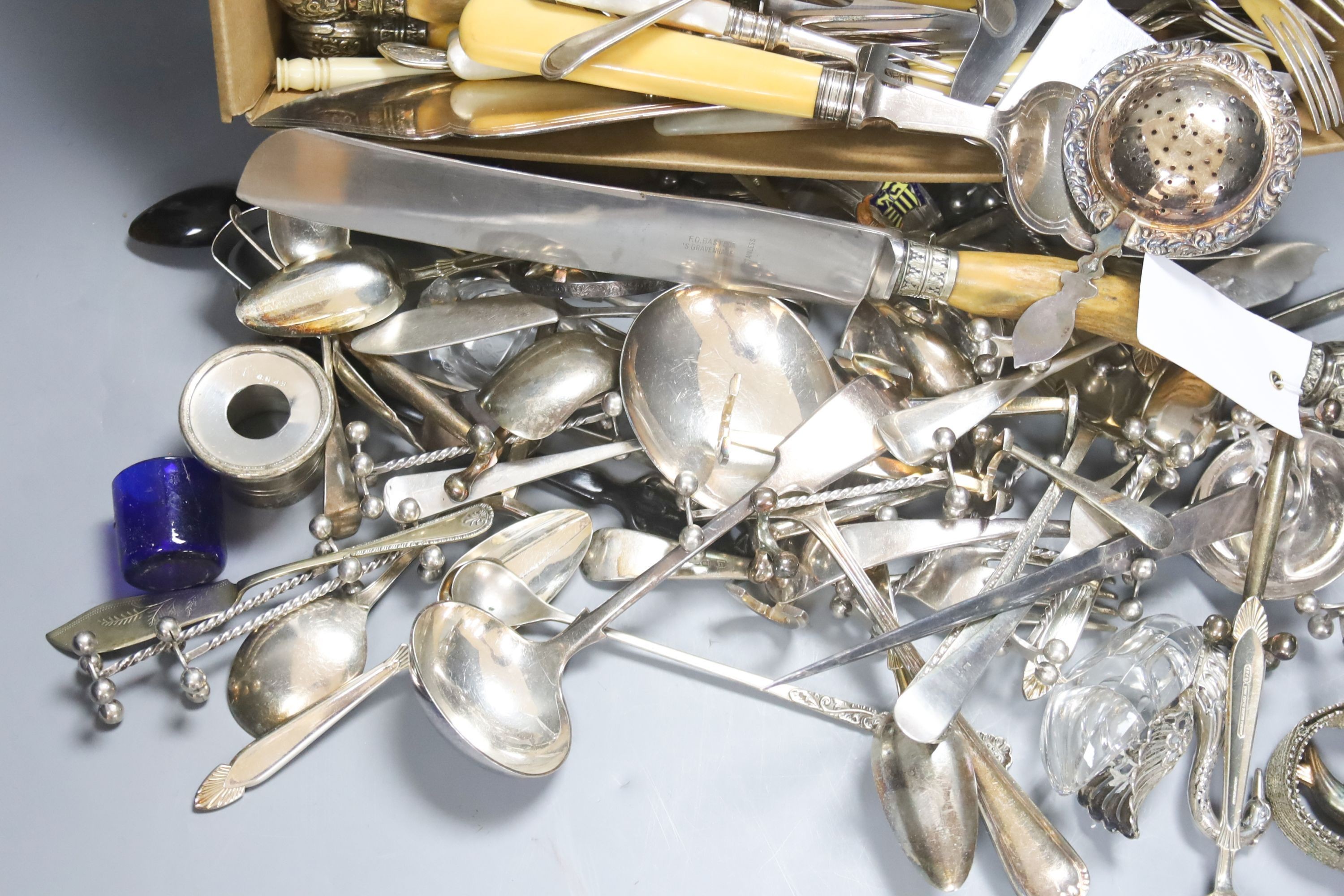 A quantity of silver plated flatware to include three piece stag horn handled ...... silver and mother of pearl handled dessert eaters